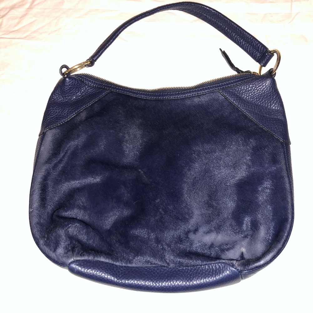 Margot Elegant Navy Leather Hobo Bag with real cow hair on one side.